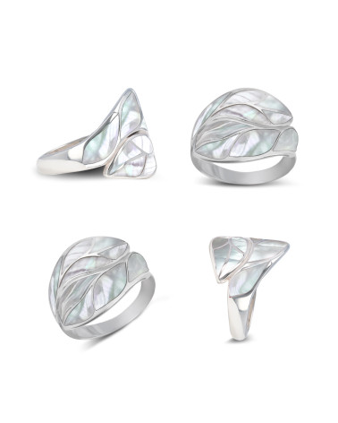 Explore the multiple facets and finesse of our handcrafted abalone mother-of-pearl and silver ring.
