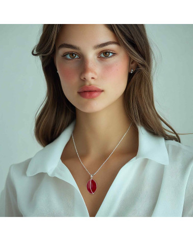 Elegance of the red coral leaf pendant on model
