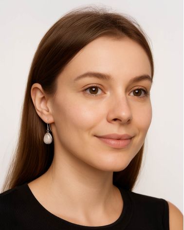 Elegance and refinement of moonstone earrings on model
